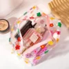 sg-11134201-7ravl-ma3y7lslks9i19 Clear PVC Floral Cosmetic Bag